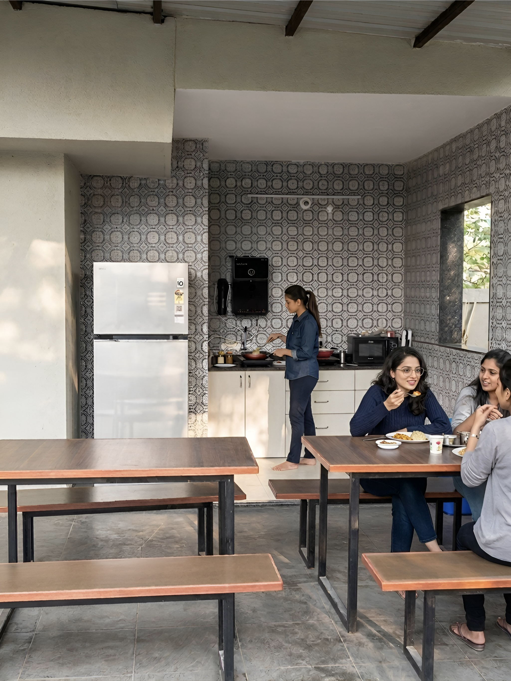Modern kitchen and dining area at D Gloaming Nest PG hostel Kalyani Nagar Pune
