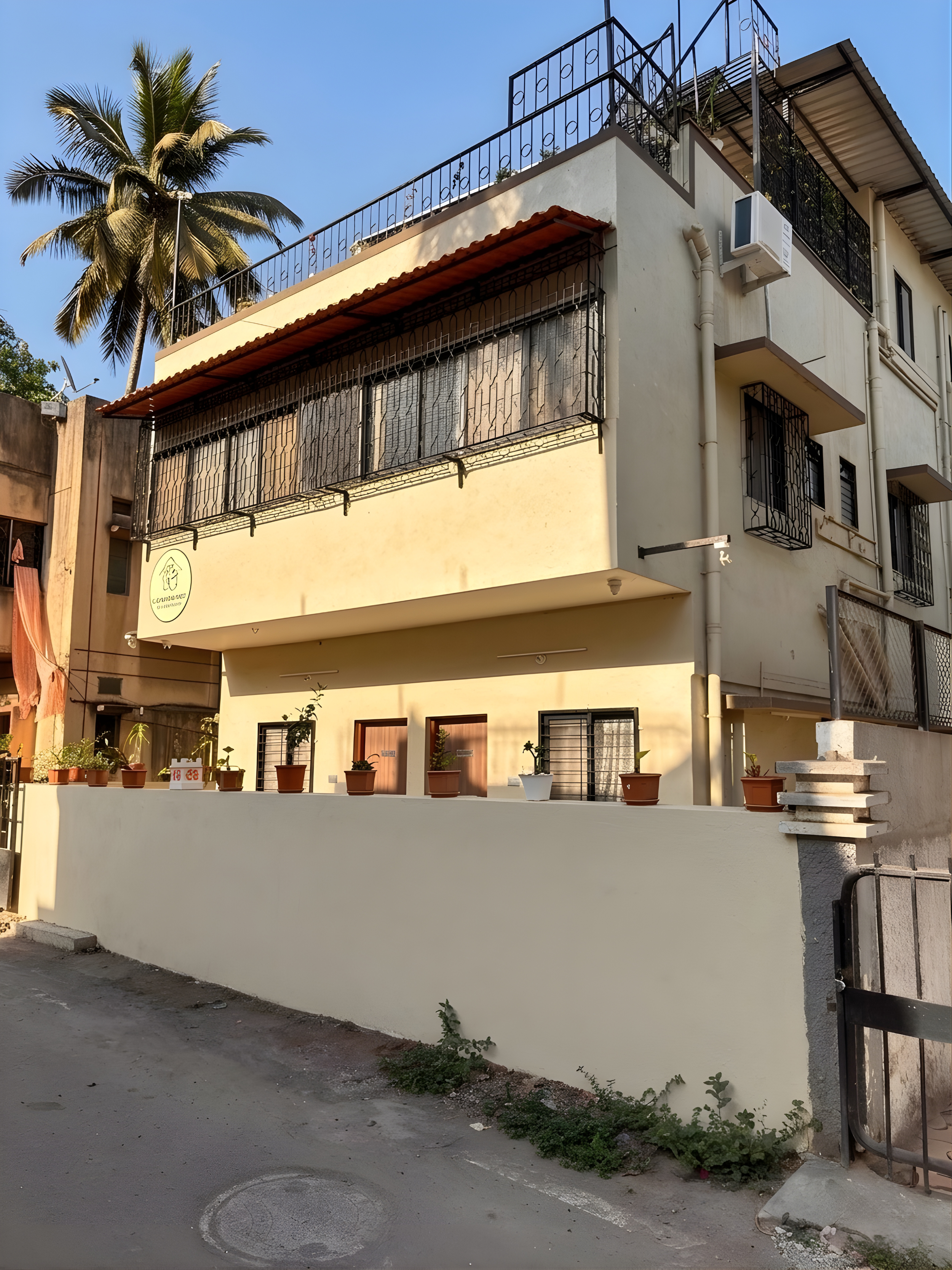 D Gloaming Nest Pune PG hostel building facade afternoon view